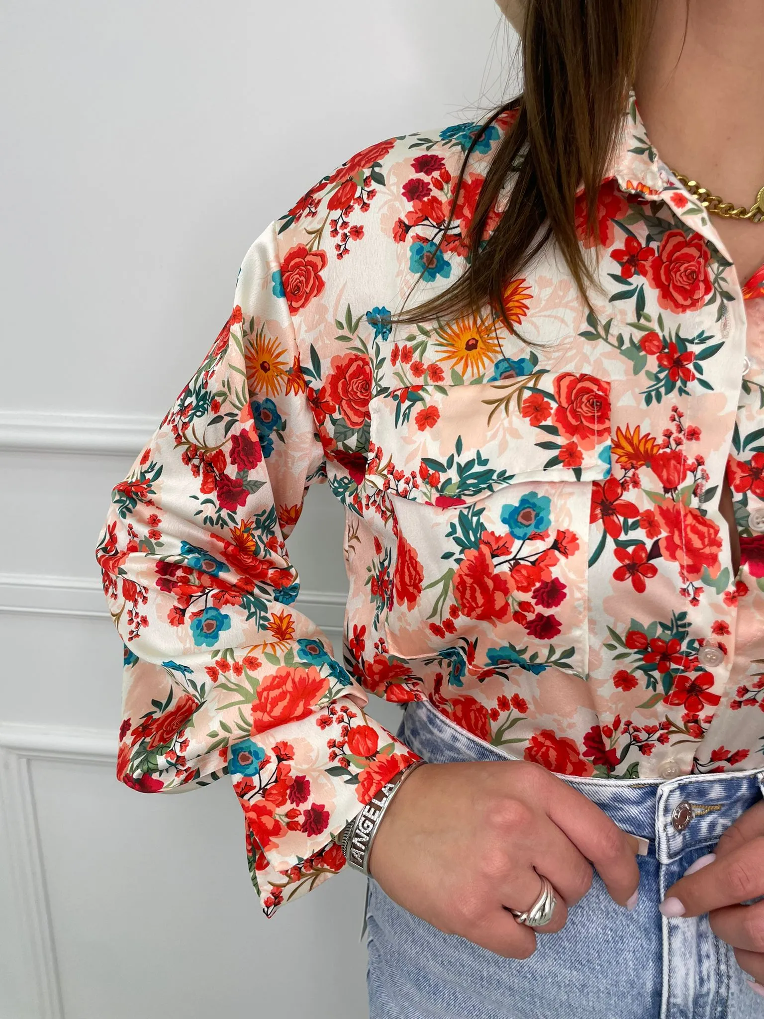 Camicia a fiori con elastico alle maniche