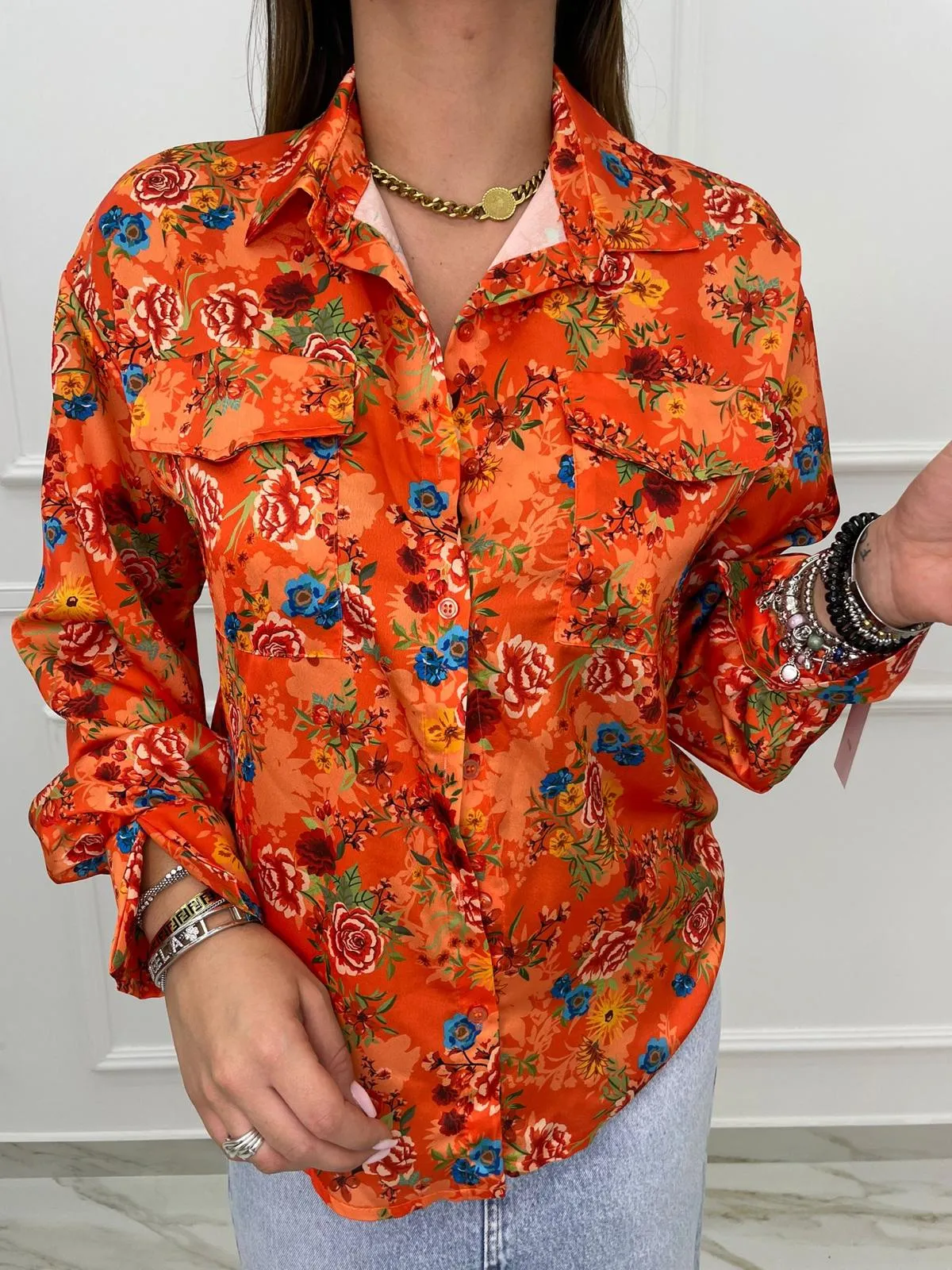 Camicia a fiori con elastico alle maniche