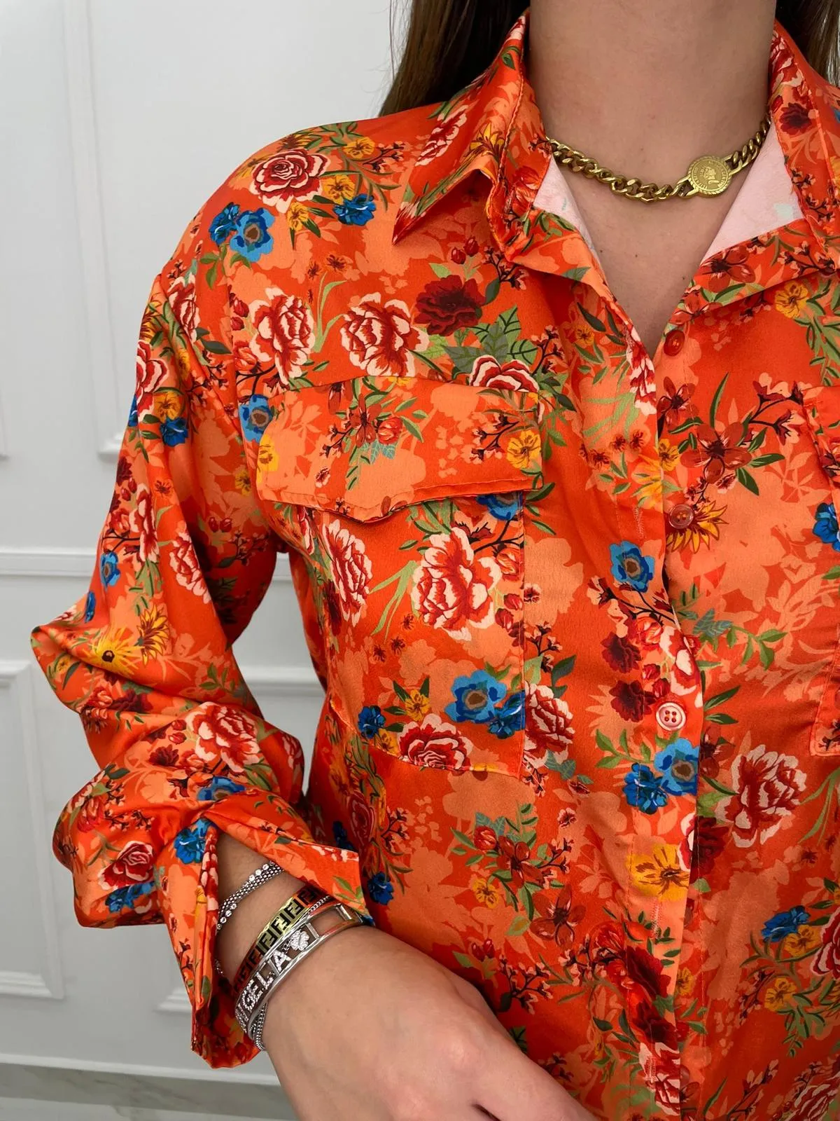 Camicia a fiori con elastico alle maniche