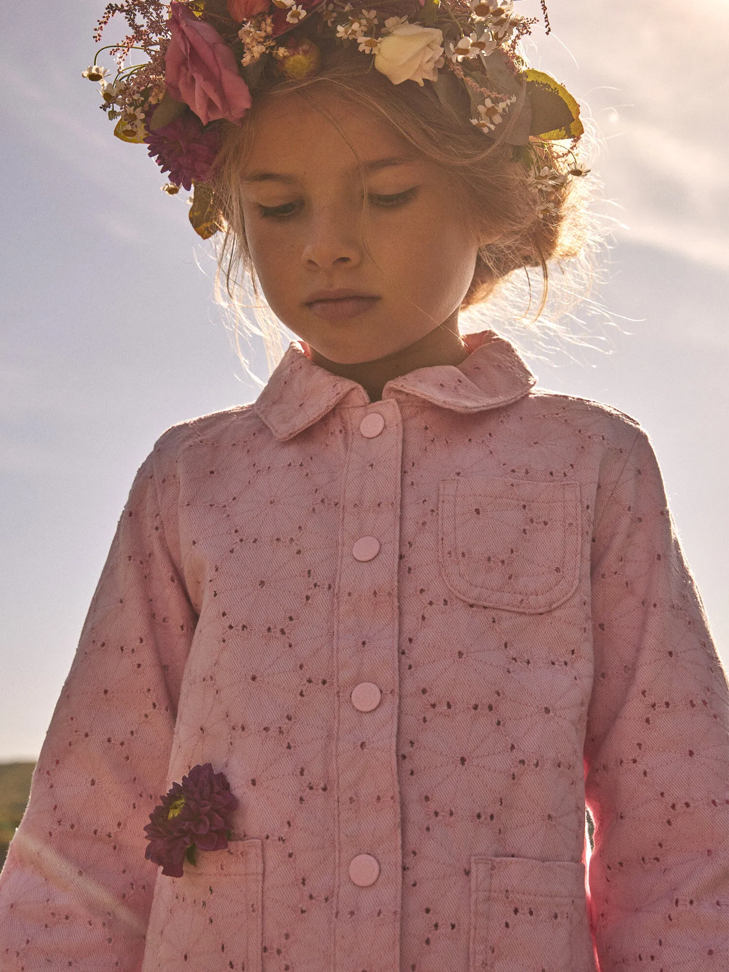 Giacca in jeans rosa traforata    