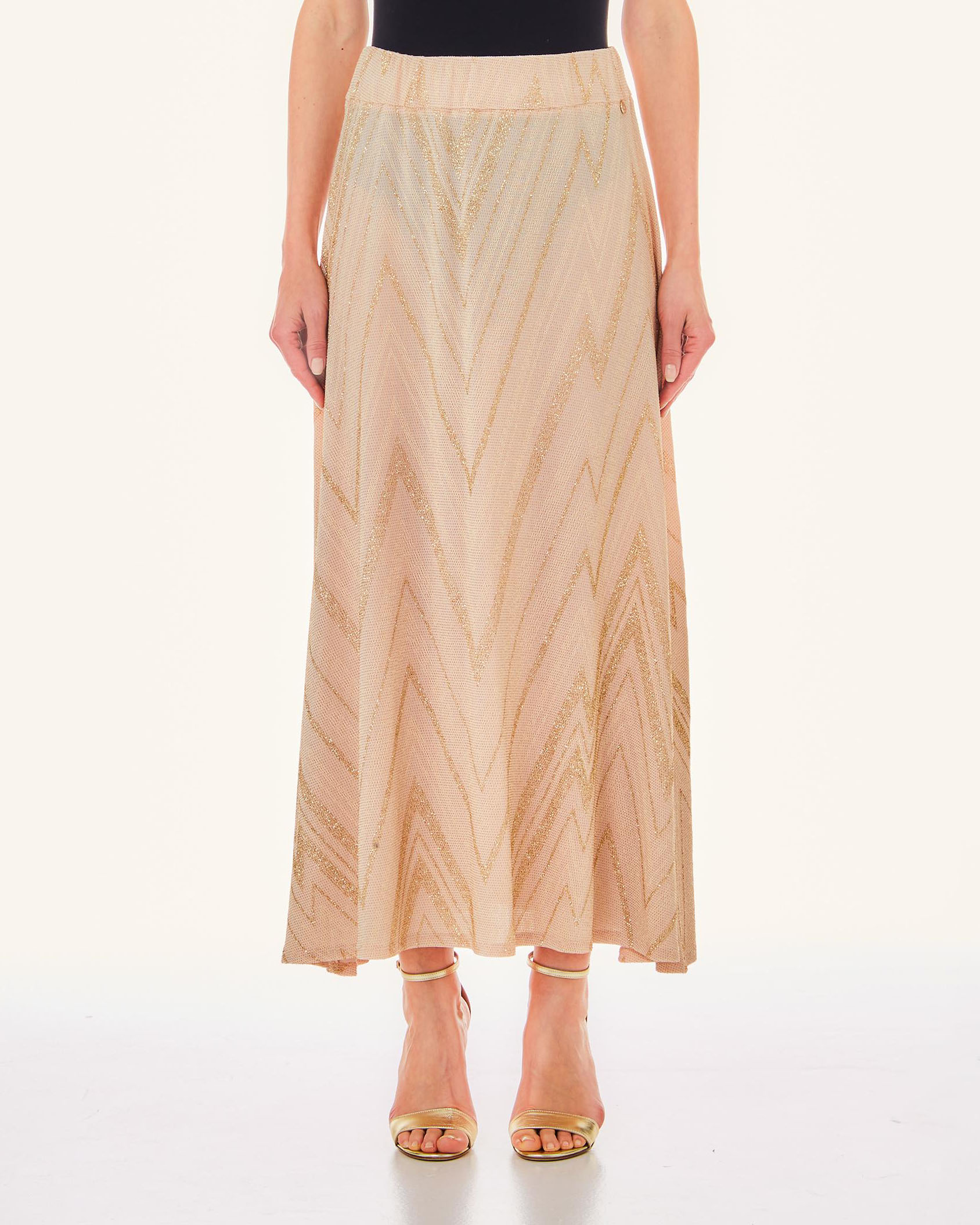 Gonna lunga beige a motivo chevron dorato con inserti in lurex