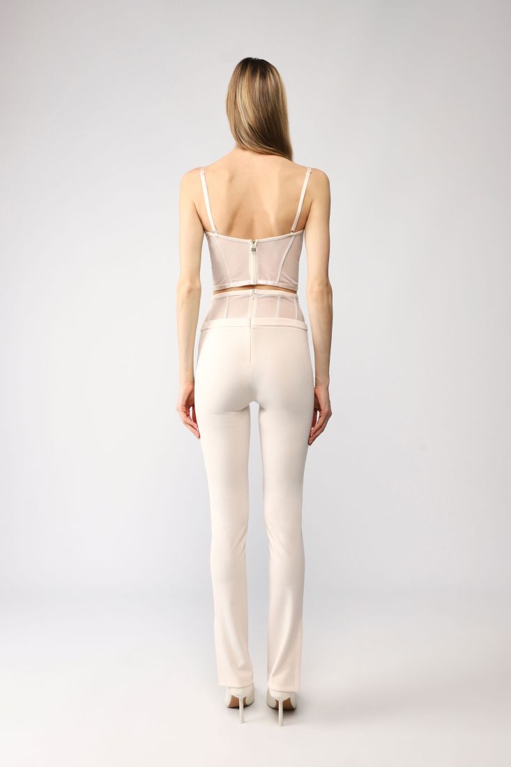 Pantaloni skinny monocolour con inserto effetto trasparenza