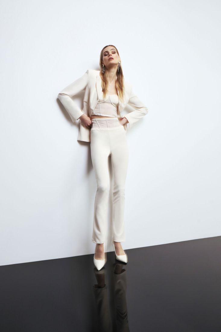 Pantaloni skinny monocolour con inserto effetto trasparenza