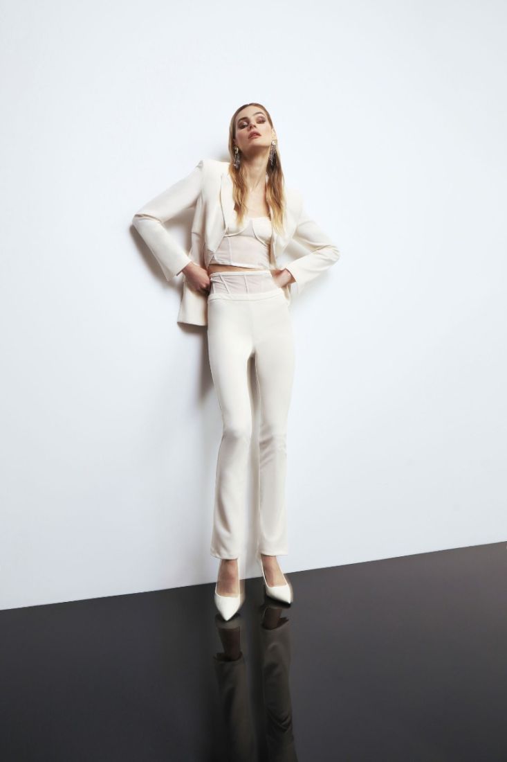 Pantaloni skinny monocolour con inserto effetto trasparenza