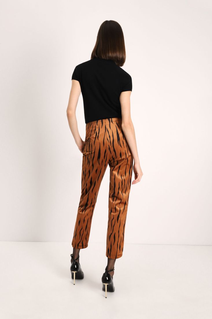 Pantaloni slim-fit fantasia animalier con tasche americane